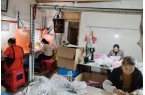 用具有限公司—以来料加工带动妇女家门口就